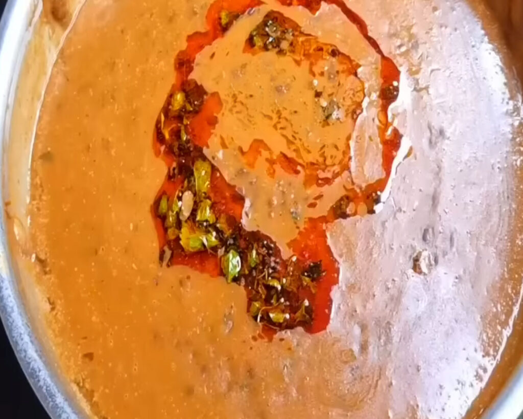 Adding Dal Makhani Tadka