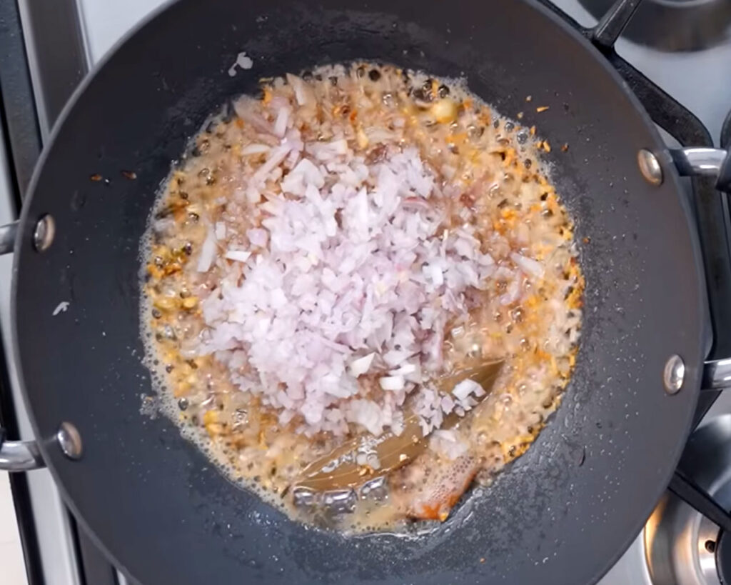 Finely chopped onions in masala