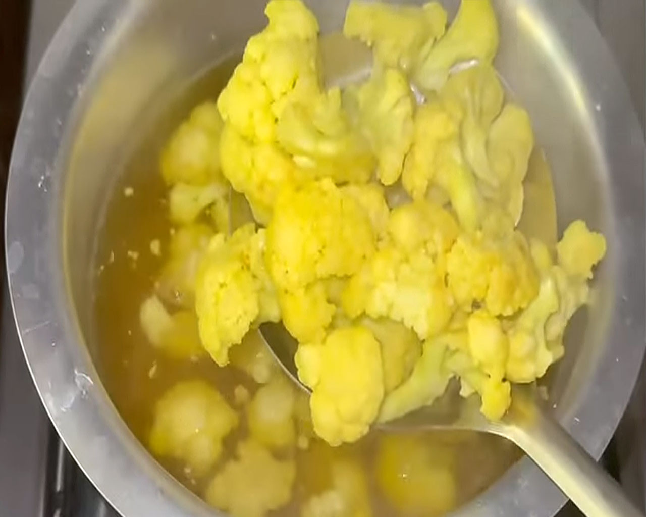 Cauliflower coated in yellow turmeric