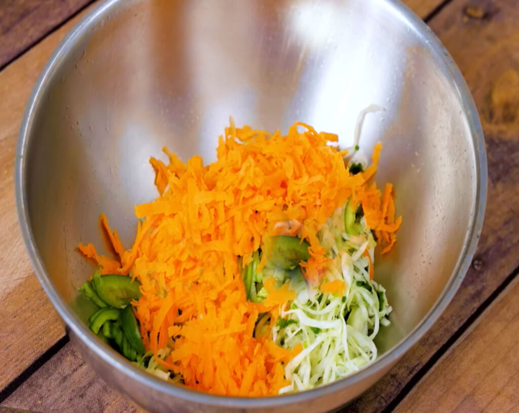 chopped carrots, capsicum, onion in a bowl for veg manchurian recipe