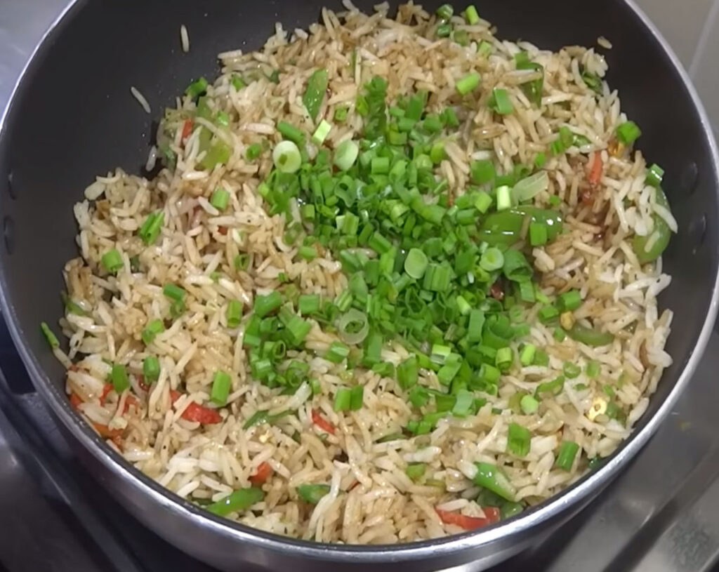 garnish veg fried rice with chopped spring onions