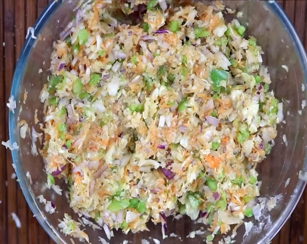 Mix vegetables to prepare filling for veg momos