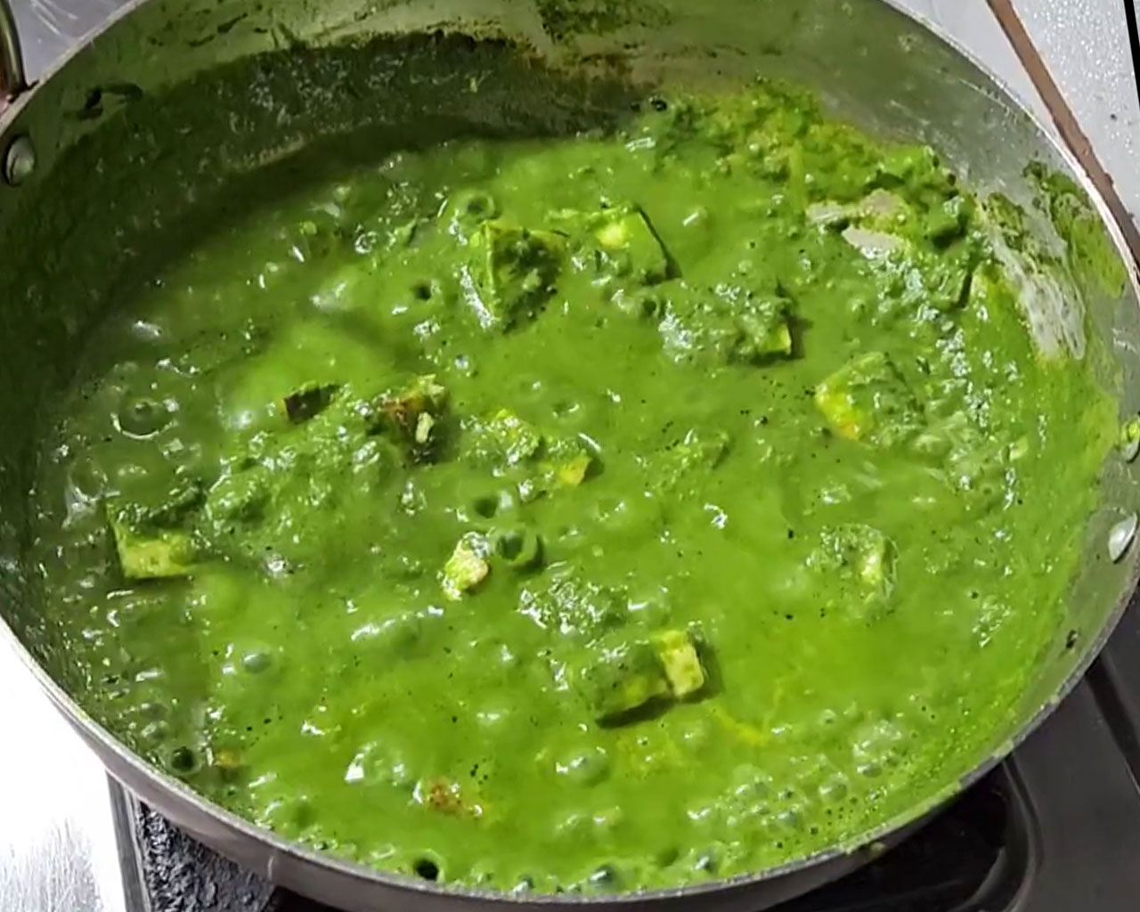 Delicious Palak Paneer with cream ready to serve hot with roti or rice