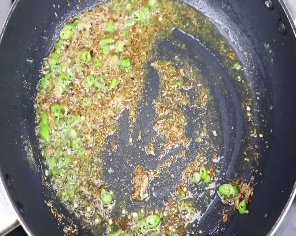 prepare filling for samosa, add green chili, cumin seeds
