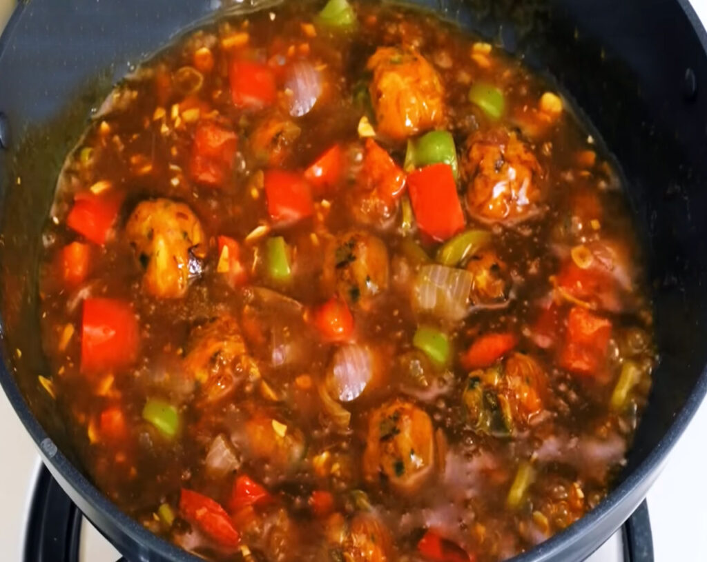 vegetable balls cooking in gravy
