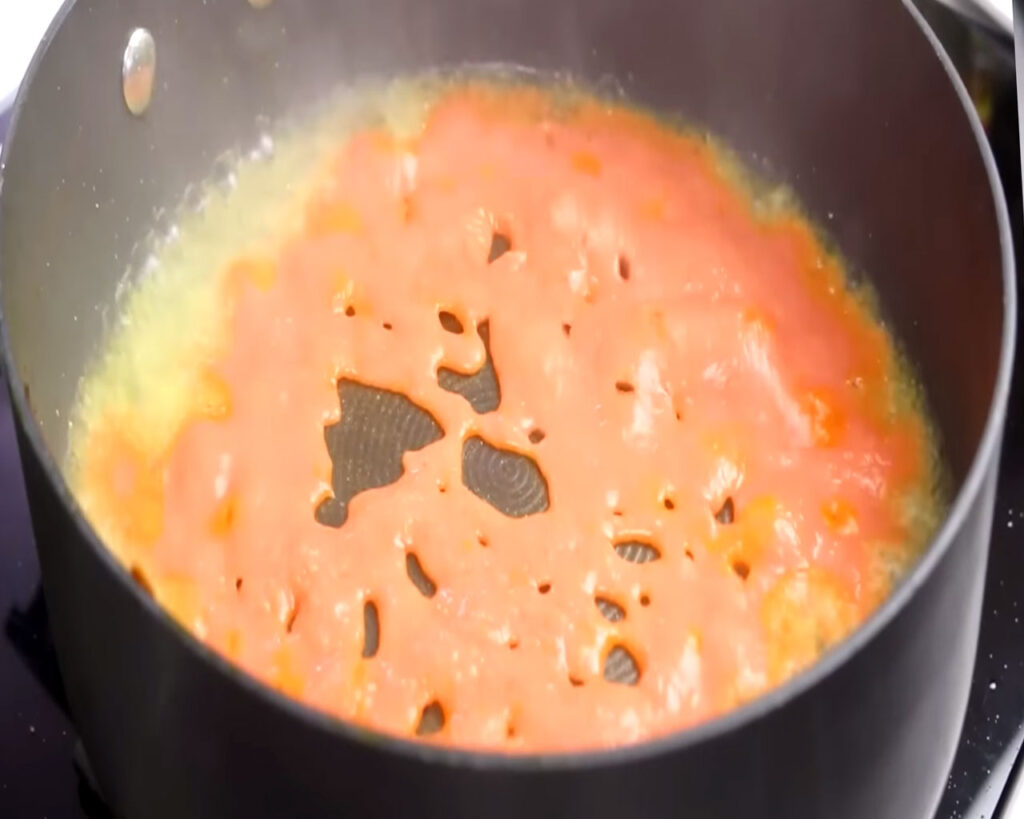 preparing bhindi masala gravy
