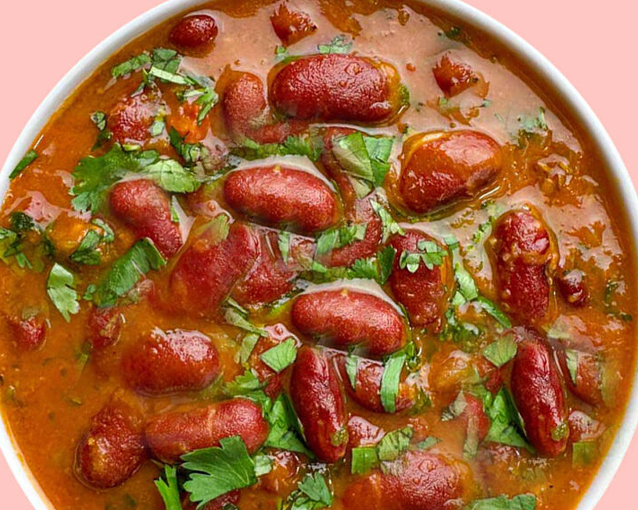Rajma Masala recipe in a bowl garnished with coriander leaves