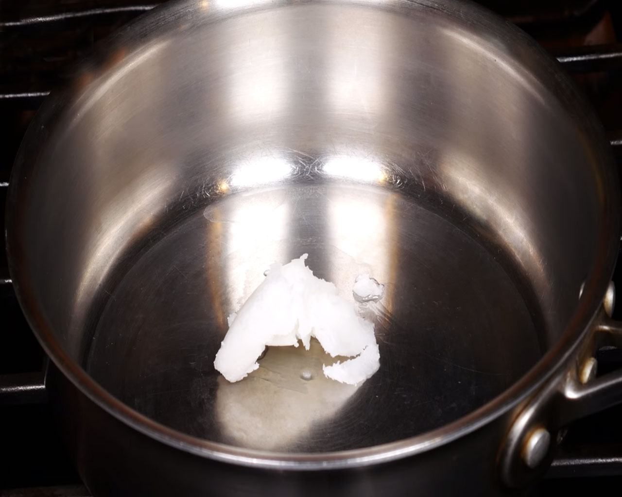 Boiling water and heating coconut oil for semiya upma