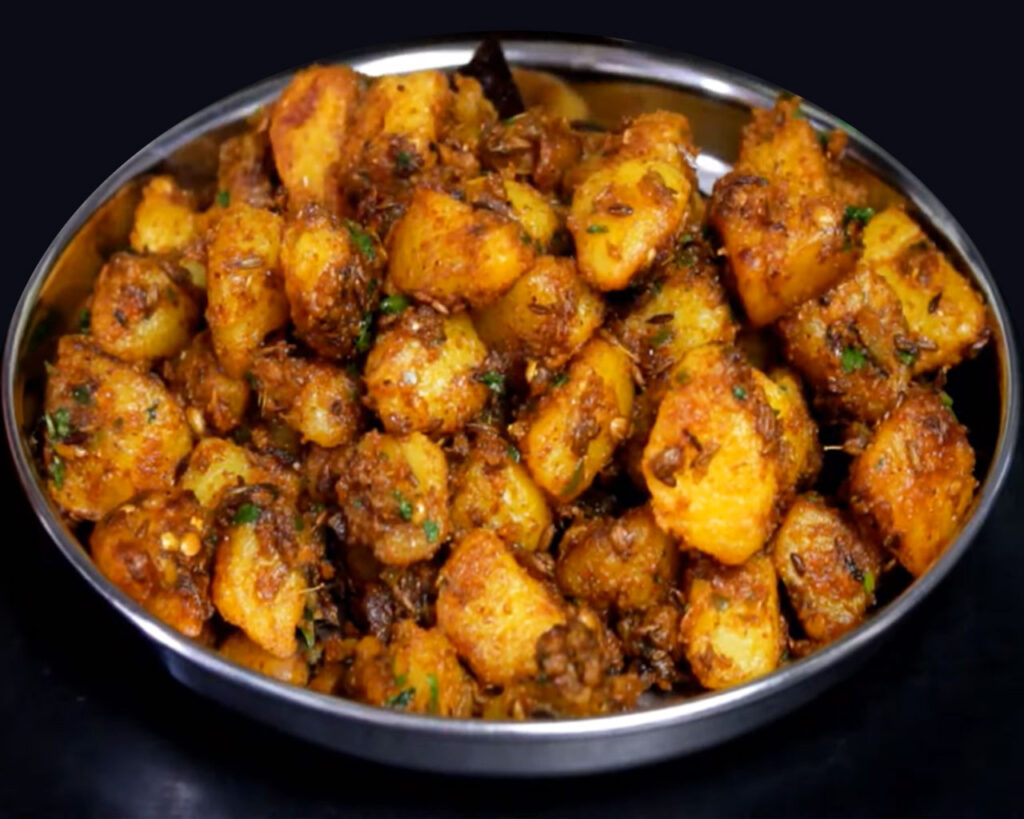 Jeera Aloo garnished with coriander leaves