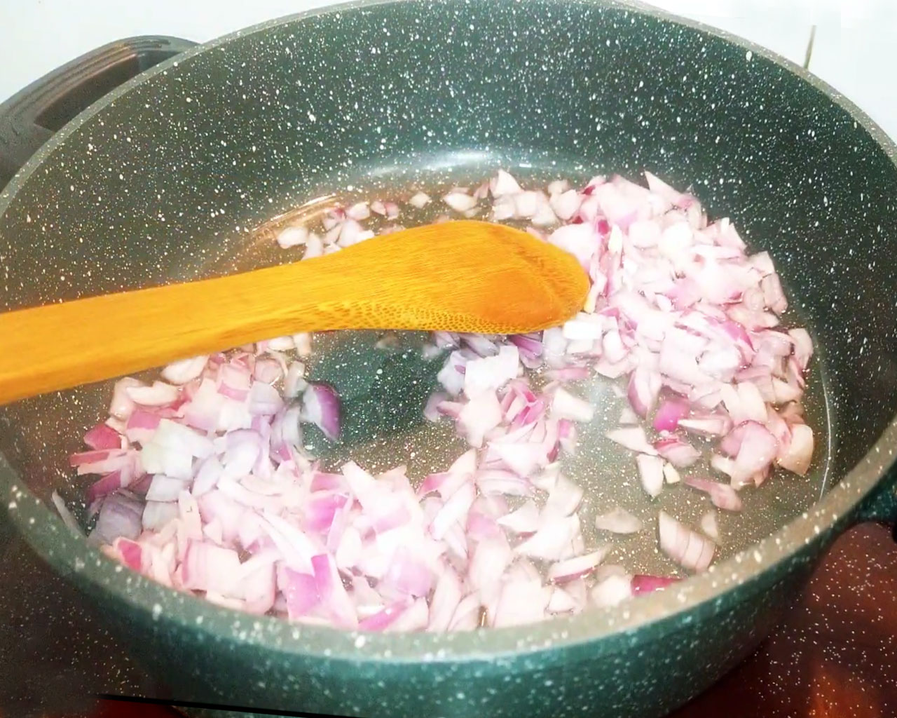 Sauteing chopped onions in oil
