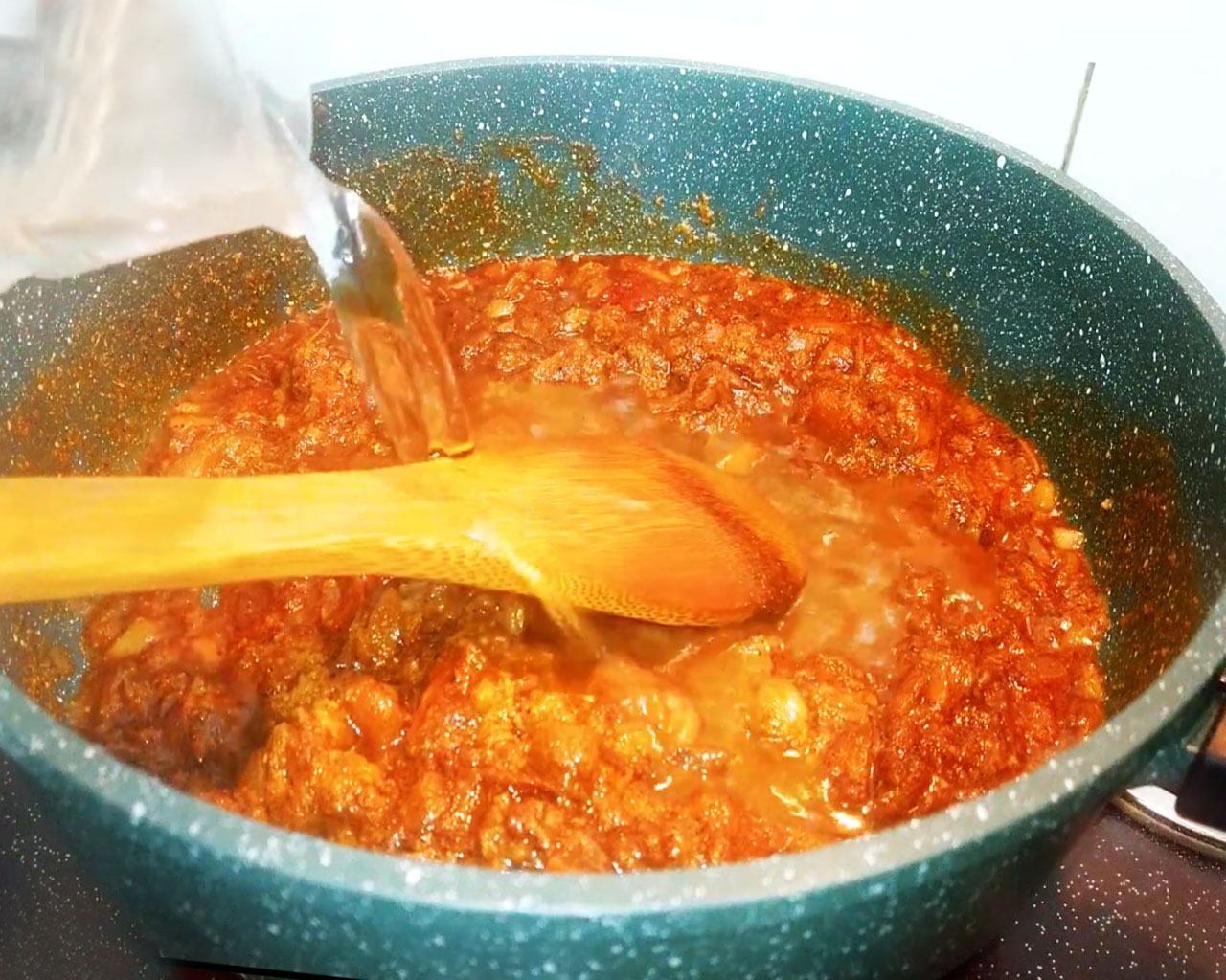 Water mixed into the spiced gravy