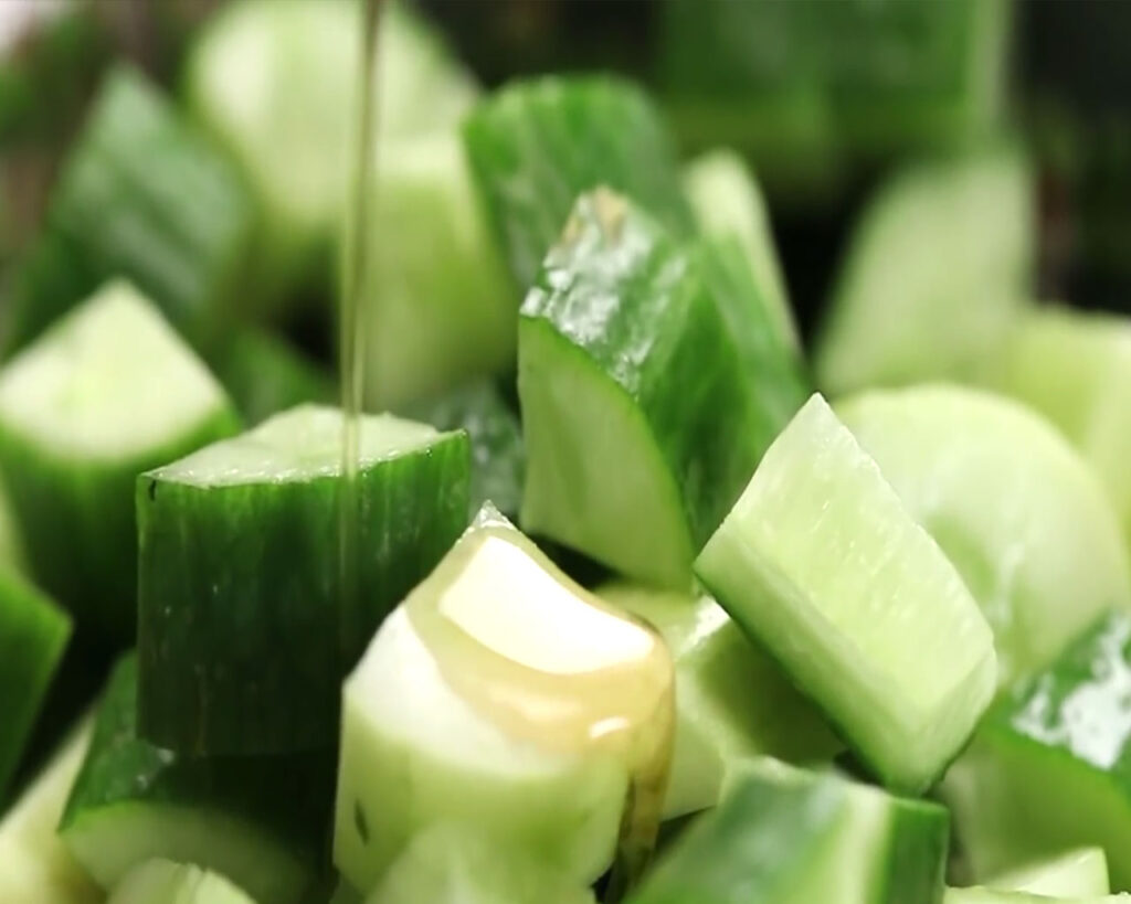 adding sesame oil in cucumber
