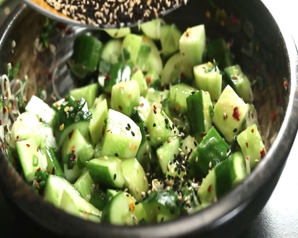 garnish cucumber salad with roasted sesame seeds