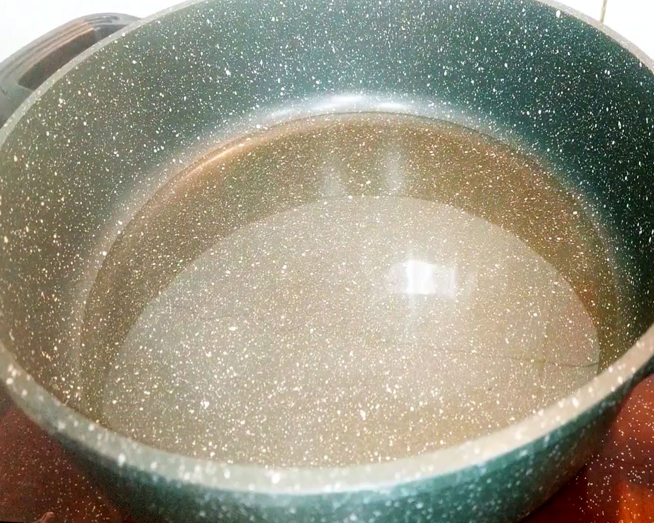 Heat oil in pan