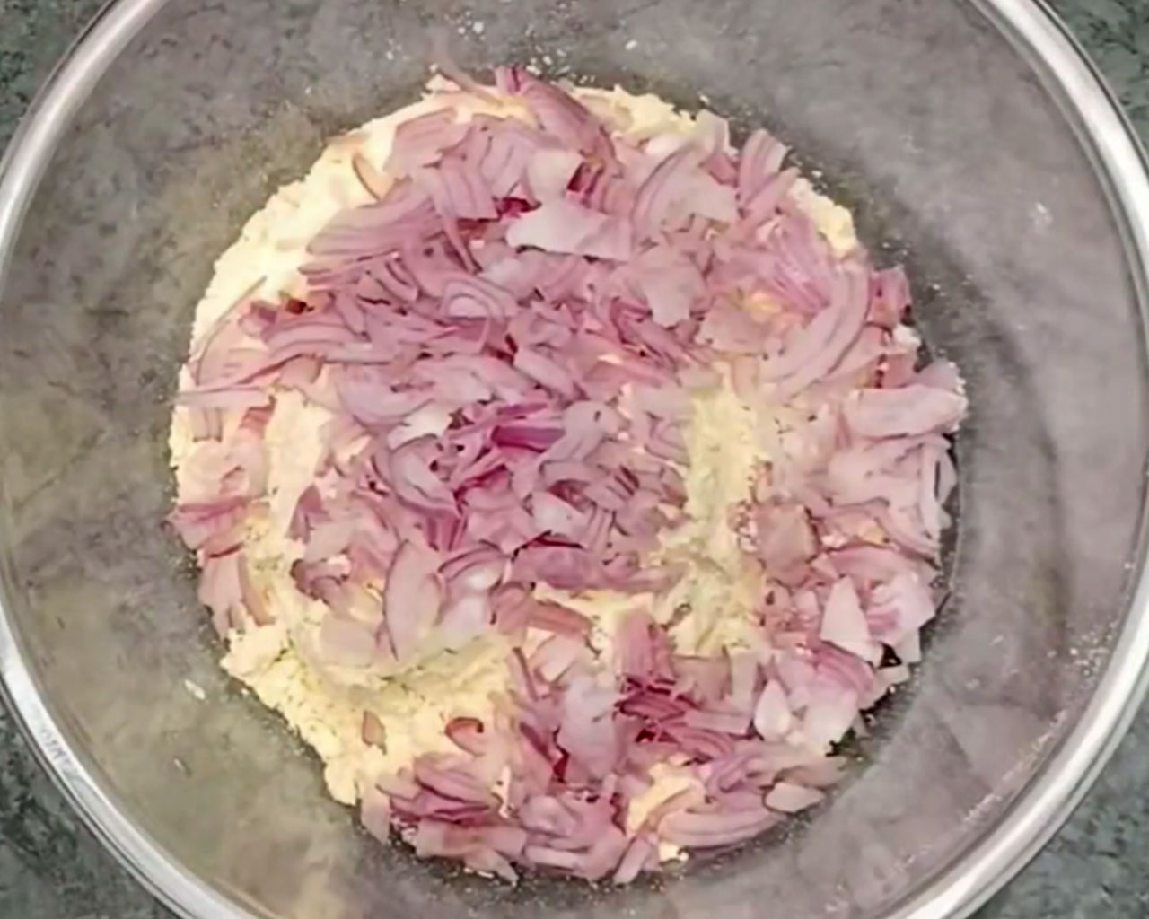 Making chilla with onions