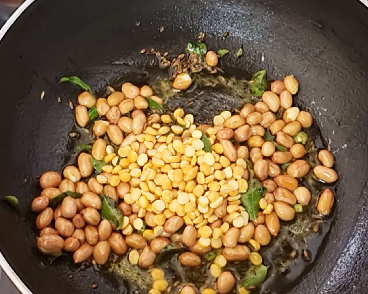 Chana dal added to pan for texture and protein