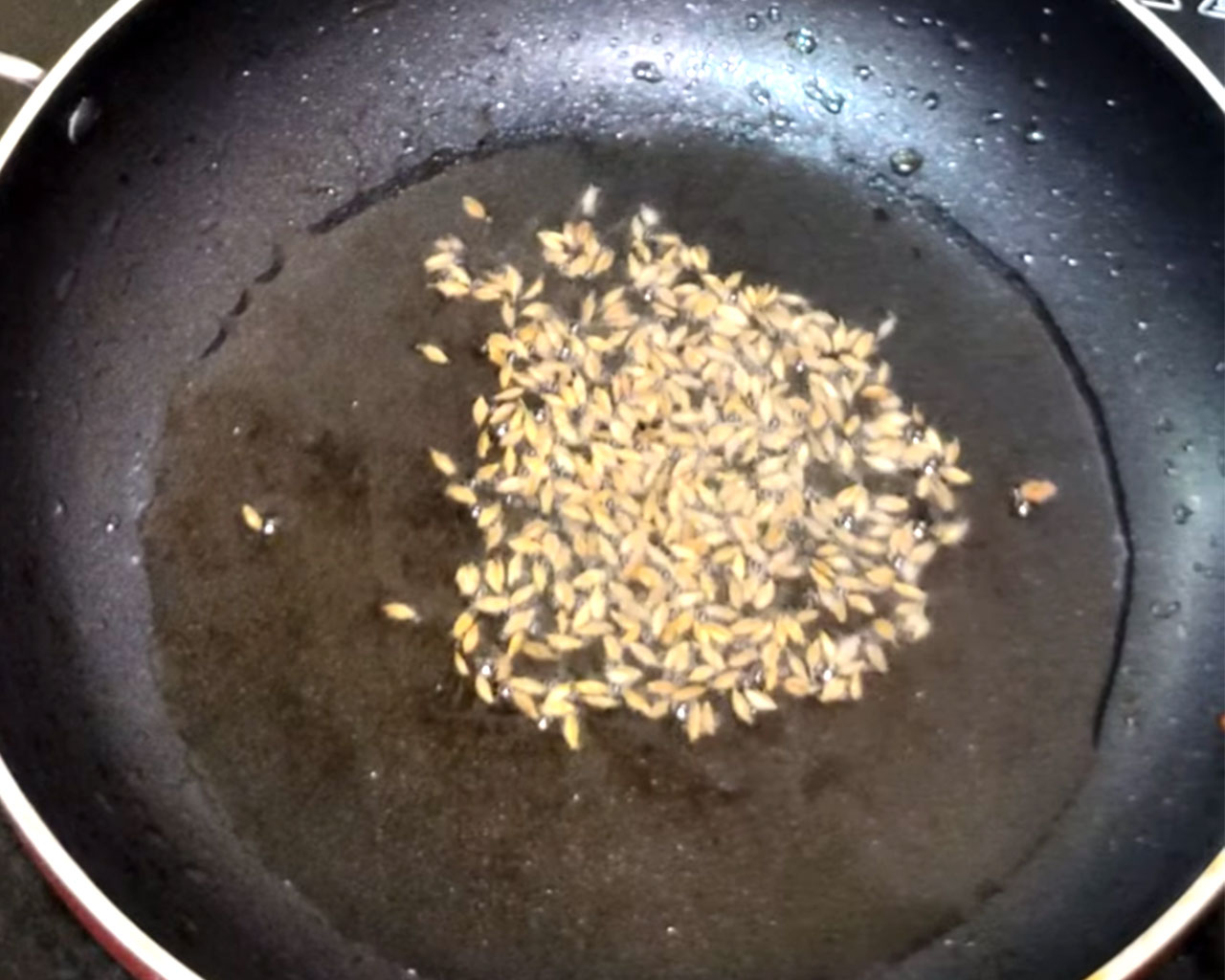 cumin seed cooking in oil