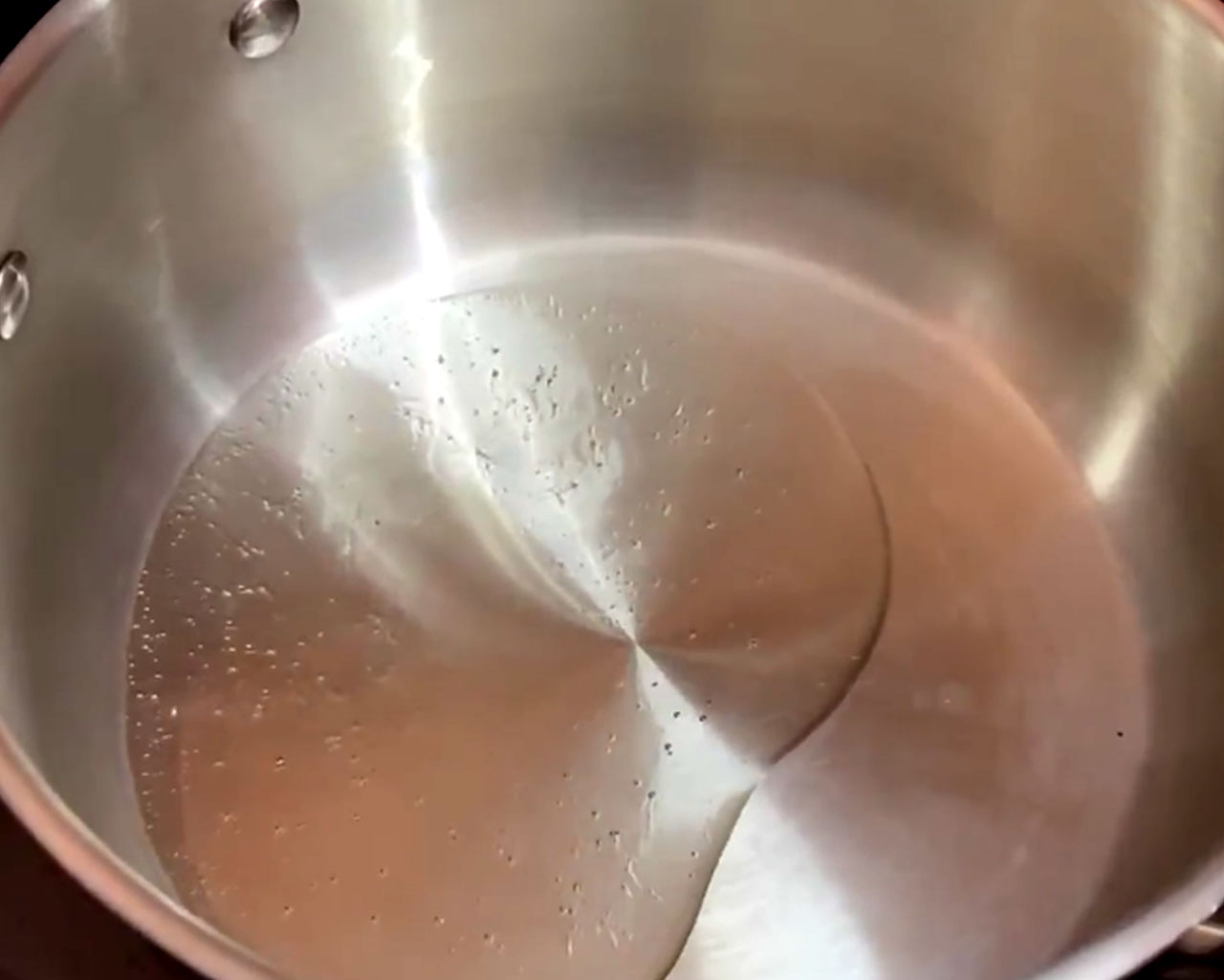 Heating oil to make south Indian veg kurma