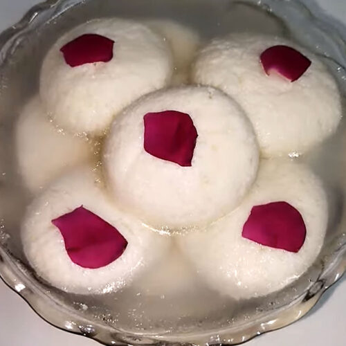 Rasgulla in sugar syrup ready to serve chilled or warm as an Indian dessert.