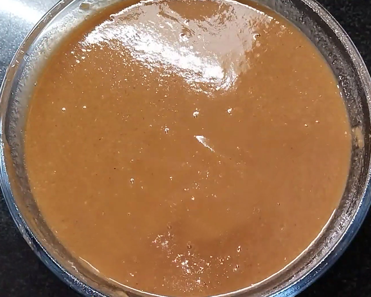 Tamarind extract in a bowl for making chutney
