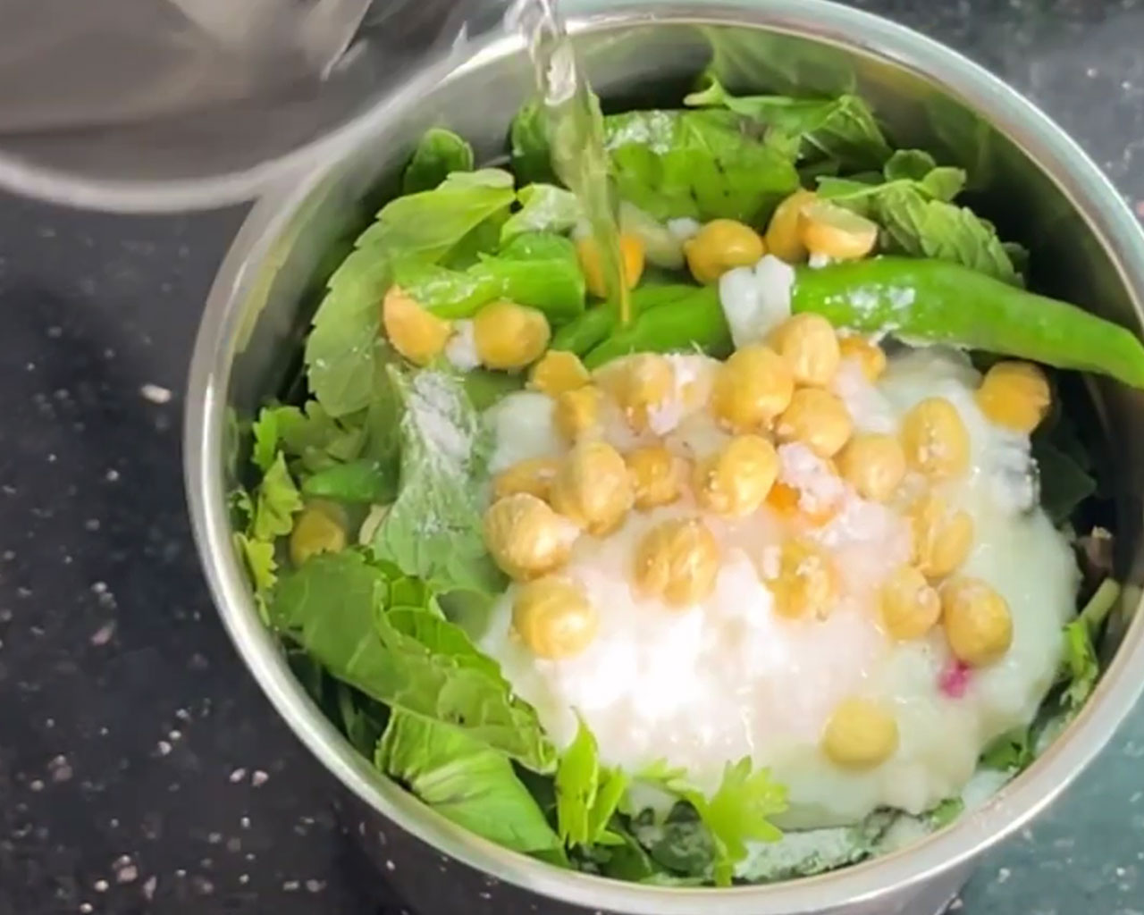 Water added in grinder jar to make mint chutney