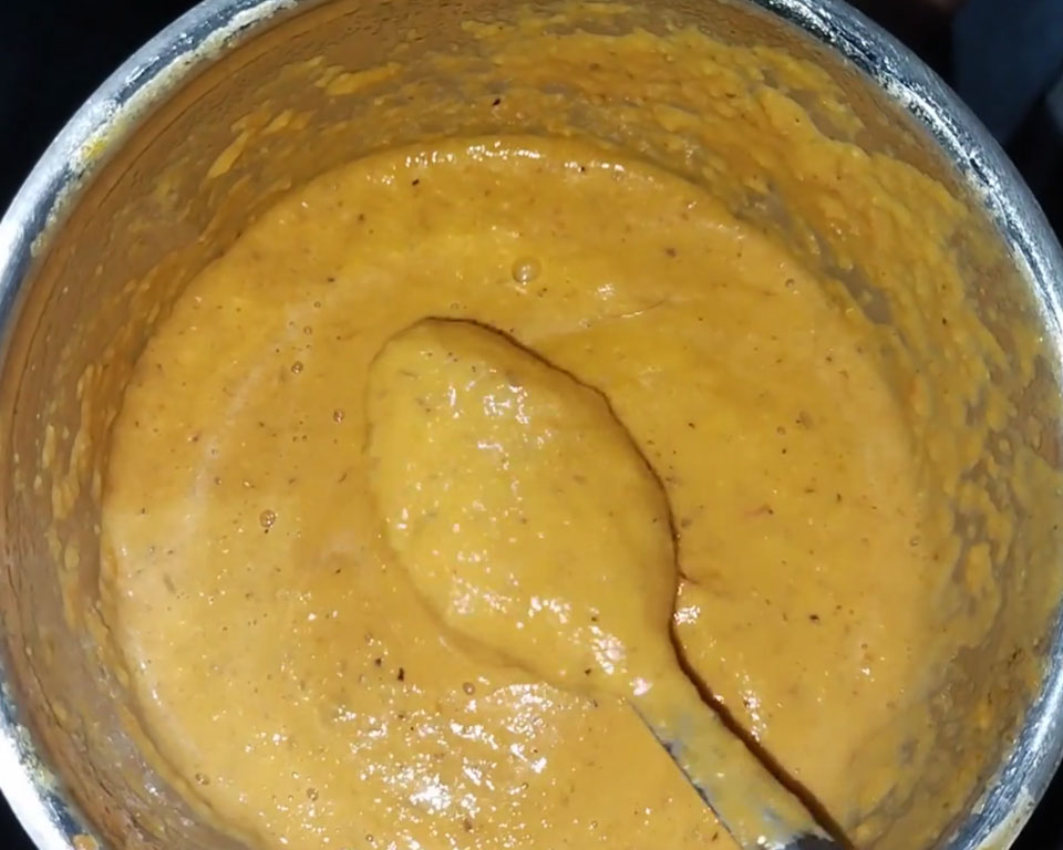 Malai kofta onion-tomato curry gravy.