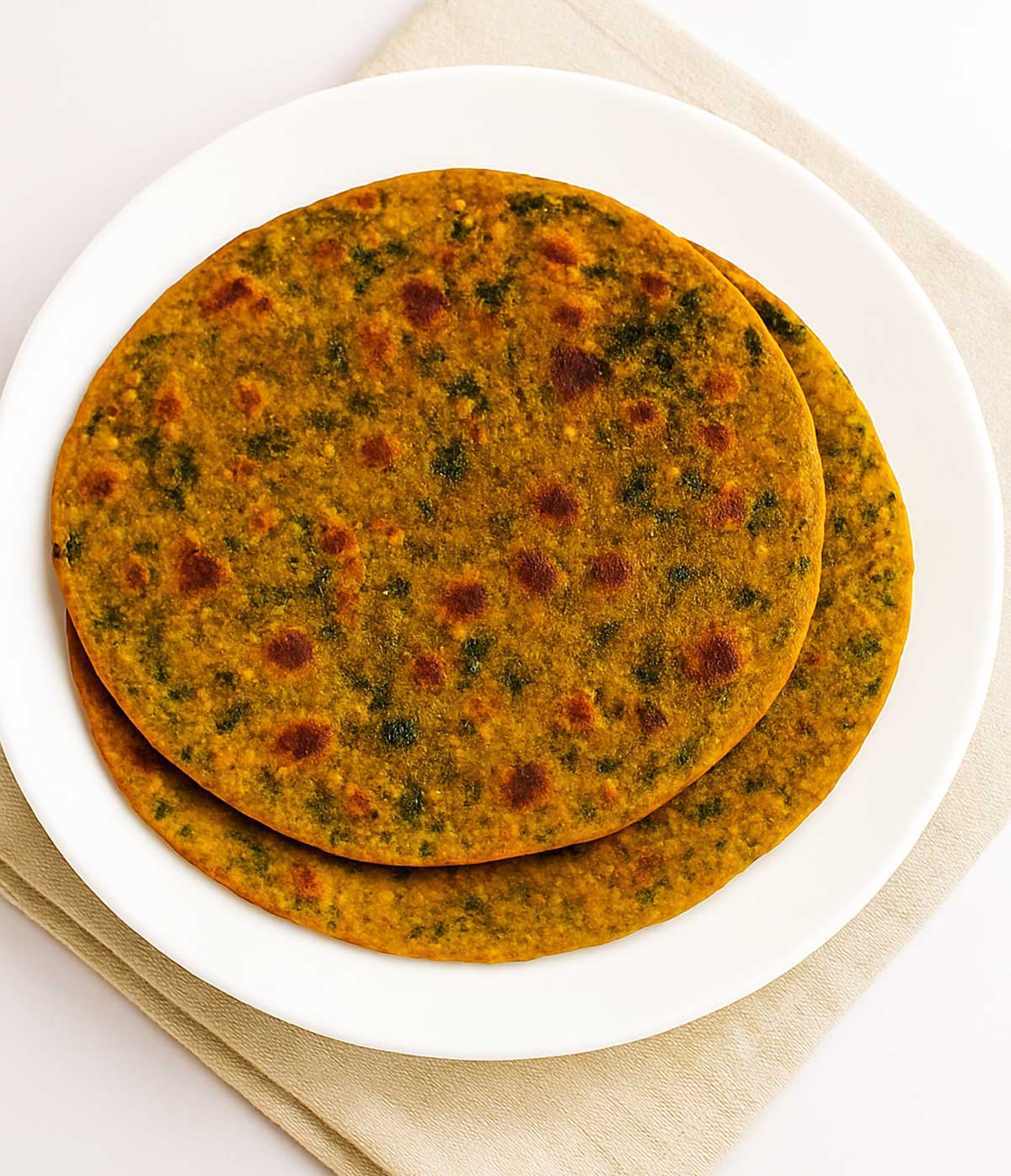 Authentic Gujarati thepla served on a plate for a healthy Indian snack recipe